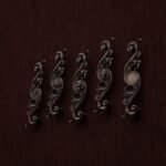 Comparaison des motifs — poignée de meuble Arabesque Classica Cuivre Ancien XL — Holdon Paris