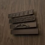 Comparaison des motifs — poignée de meuble Barre Palazzo Bronze Mat L — Holdon Paris