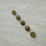 Comparaison des motifs — poignée de meuble Rond Classica Laiton Satiné L — Holdon Paris