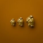 Comparaison des tailles — poignée de meuble Torse Florentin Golden Sun — Holdon Paris
