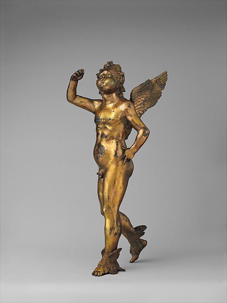 Small figure of a fire-gilded winged sprite in bronze, the worn gilding revealing the metal's brown patina beneath
