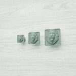 Palazzo Square, Sleeping Lion, S, Submerged Bronze, size comparison