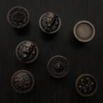 Comparaison des motifs — poignée de meuble Rond Classica Bronze Ancien S — Holdon Paris