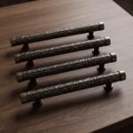 Packshot de 4 columnas de volutas en bronce envejecido
