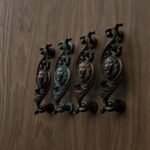 Classica Arabesque, Sleeping Lion, M, Antique Bronze, color comparison
