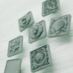 Comparaison des motifs — poignée de meuble Carré Palazzo Bronze Immergé L — Holdon Paris