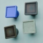 Comparaison couleur Bleu : poignée de meuble Carré Palazzo Essentiel S en résine biosourcée, bronze et cuivre (Holdon Paris)