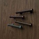 Florentine Column, Rosette, S, Matte Bronze, color comparison