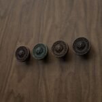 Comparaison couleur Marron : poignée de meuble Rond Classica Soleil Royal M en bronze et cuivre (Holdon Paris)