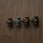 Comparaison couleur Marron : poignée de meuble Torse Florentin L en bronze et cuivre (Holdon Paris)